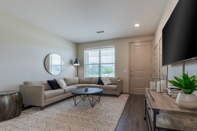 Hardwood-Style Flooring Throughout Main Living Areas *