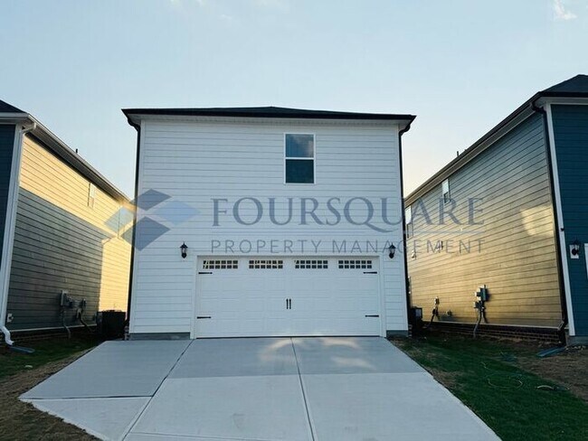 Photo - Modern 4-Bed / 2.5-Bath Single-Family Home with Loft, Gas Fireplace & 2-Car Garage – Near Downtow...
