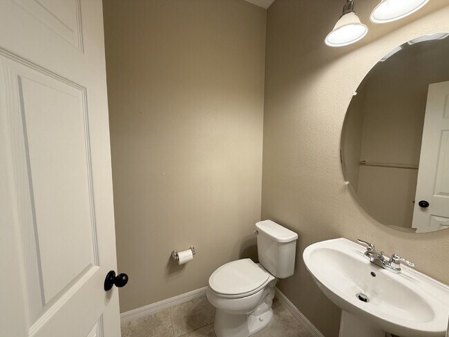 Photo - Spacious 4-Bedroom Retreat with additional office/den in the Heart of Trinity!