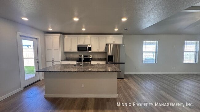 Building Photo - 7710 Elm Ave Rental