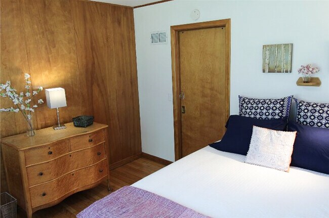 Rm #1 Birch wood paneled accent wall