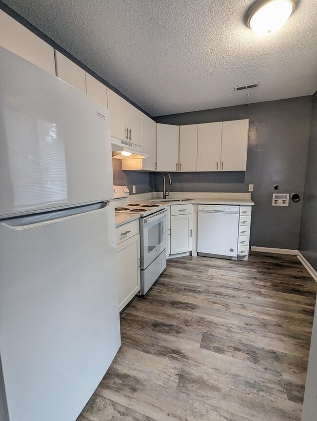 Photo - Private Fenced Yard + 3BR Townhome – Great Location!