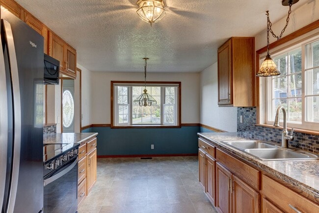 Photo - Charming 2-Bedroom Home with Bonus Room Ne...