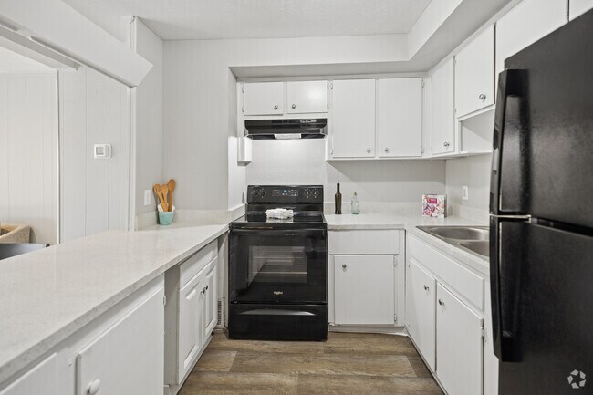 2BR, 1,5BA - 1,080SF - Kitchen - The Park at River City