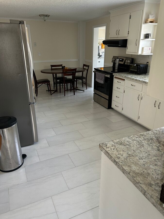 Remodeled kitchen with appliances - 37 River St Apartments Unit 37 River Street