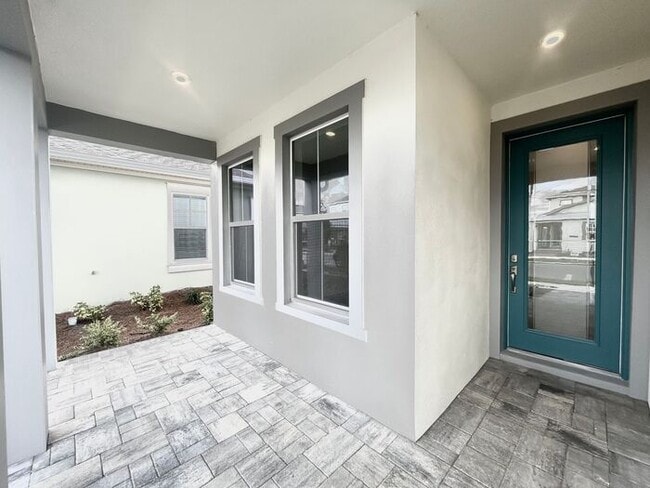 Photo - Gorgeous 4/3 Residence with a Private Back Lanai and a 3 Car Garage in the Delightful Laureate Pa...