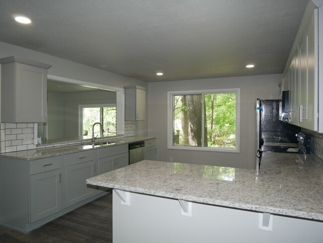 Building Photo - Gorgeous 4 bedroom, 2.5 bath House on a 1 ...
