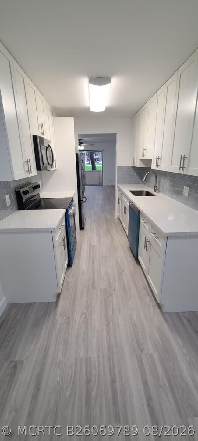 Photo - 1200 SW 124th Terrace Unit 105-O