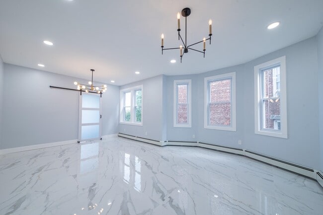 Building Photo - 1409 Manhattan Ave Rental