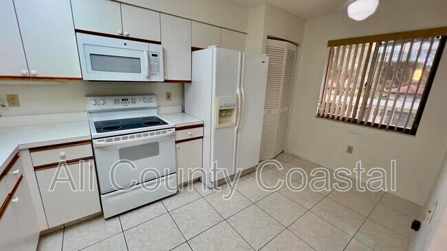 Photo - 6121 Pointe Regal Cir Unit 209