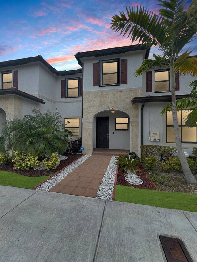 Photo - 10598 W 32nd Ln Townhome
