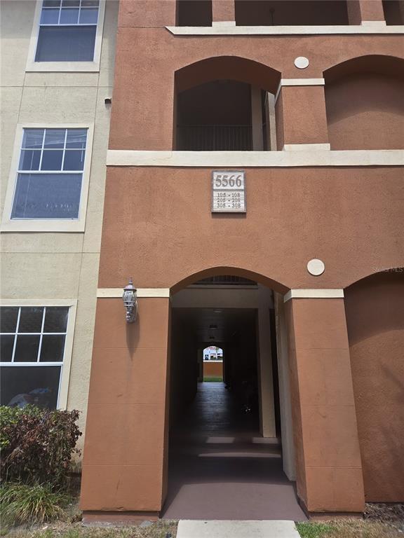 Building Photo - 5566 Metrowest Blvd Unit 2-205