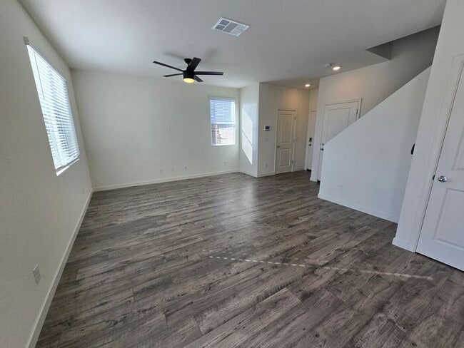 Photo - Modern 3-Bedroom Townhome with 2-Car Garage, Bright Interiors & Private Patio