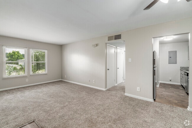 3BR, 1BA - 1,012SF - Dining Room & Living Room