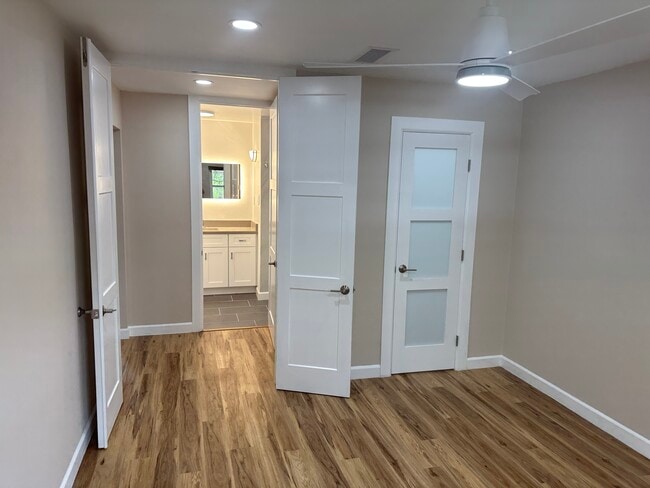 View from bedroom looking towards bathroom and closet - 4800 N Stanton St Unit CamelotCondo 42