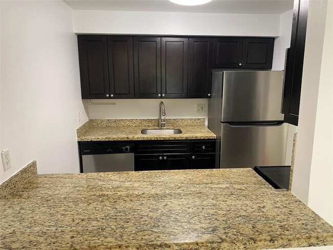 Building Photo - 14201 SW 88th St Unit 409D