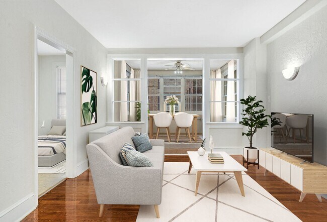 Living and sunroom (virtually staged)