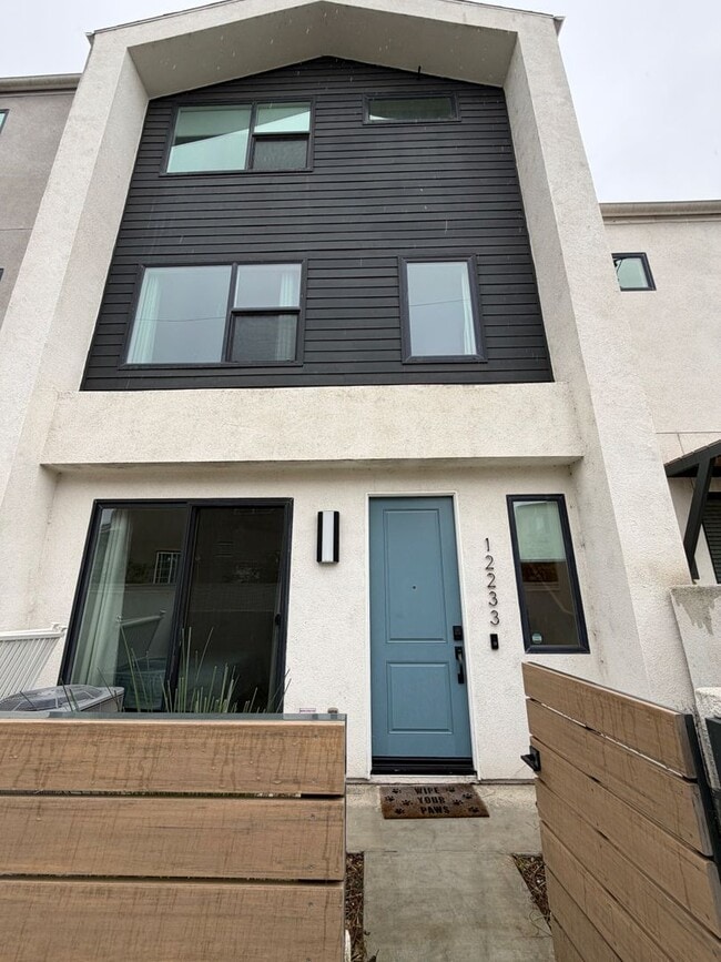 Building Photo - Smart, Modern 4-Bedroom Townhome Near Disneyland & Major Freeways