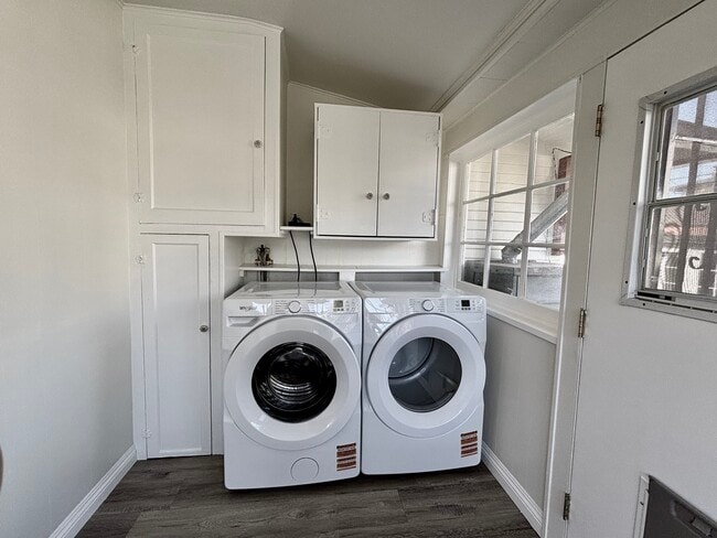 front loading washer and dryer, in bonus room - 3549 Schaefer St