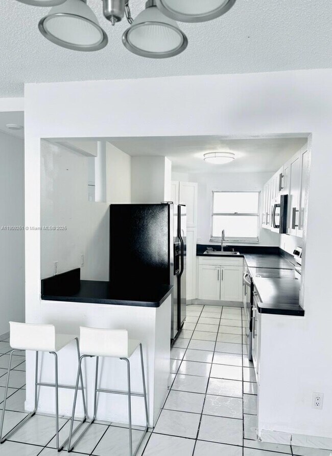 Photo - 1750 W 46th St Unit 535