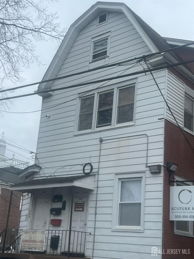 Building Photo - 463 Main St Unit 1