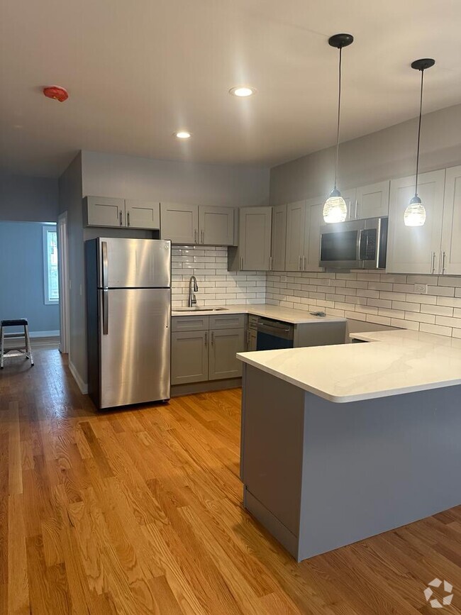 Building Photo - 2224 W 24th St Unit Apt 1