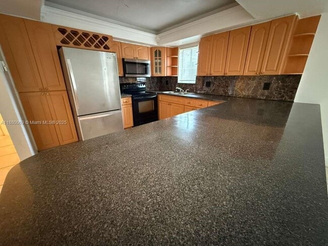 Photo - 2660 W 76th St Unit 209