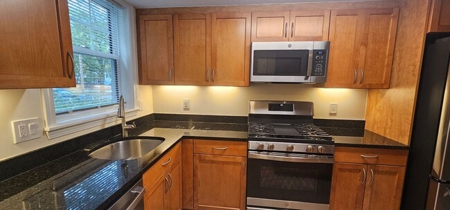 Photo - Spacious 2-bedroom townhouse on beautifully landscaped grounds.