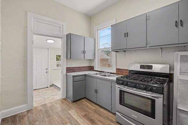 Photo - Charming 2 Bed / 1 Bath Duplex with Private Yard & Off-Street Parking
