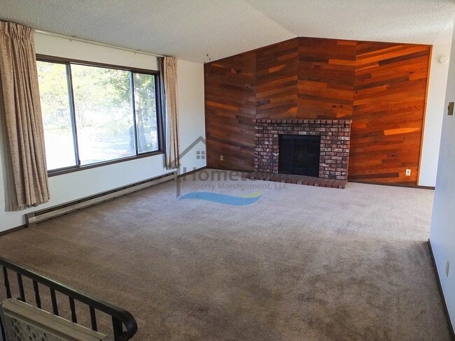 Photo - Spacious 4 Bedroom Home with Fenced Backyard & Garage