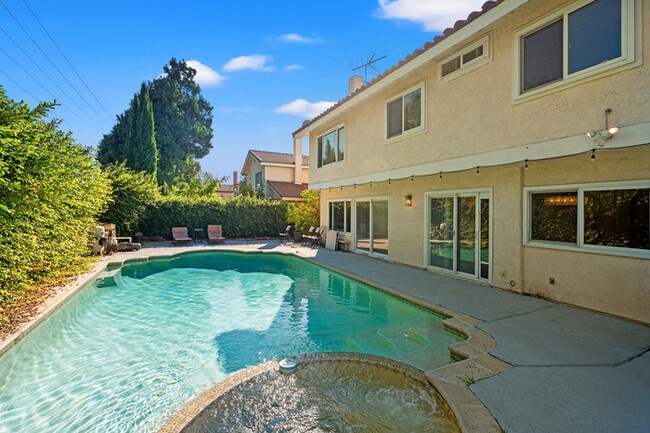 Building Photo - Spacious 4BR Family Retreat w Private Pool