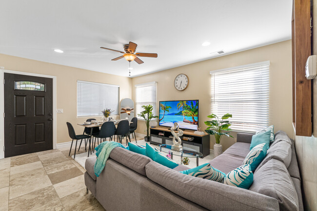 Living room bathed in natural light, creating a warm and inviting atmosphere! - 6090 Rock St House