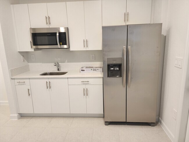 Photo - 12729 SW 211th St Unidad 1 - apartment