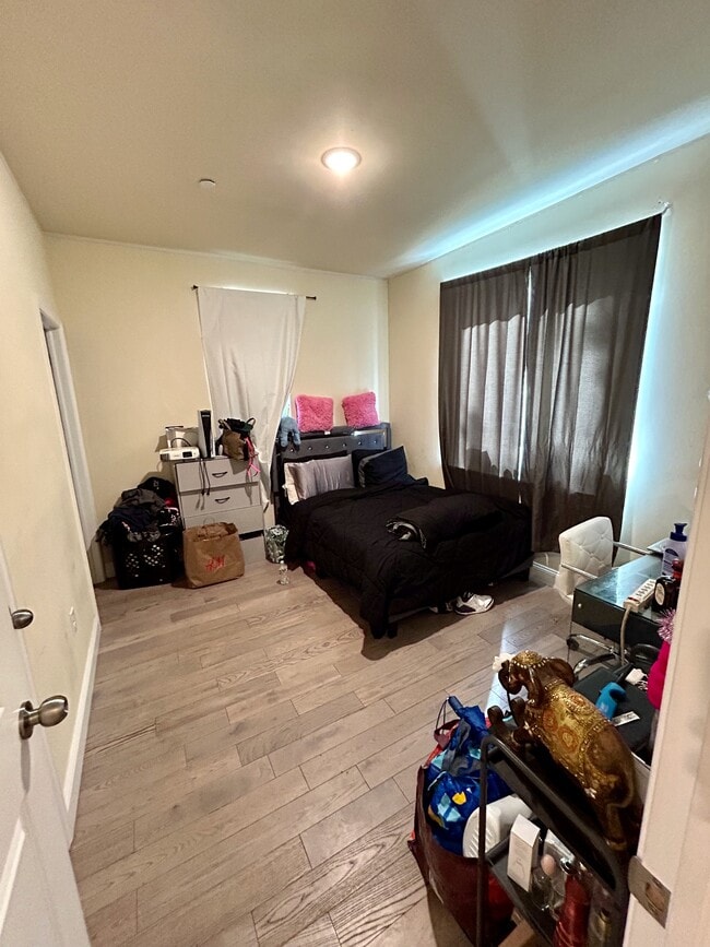 bedroom with closet and private bathroom - 1626 N Willington St Unit 1