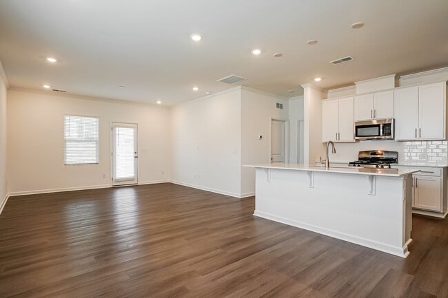 Photo - $395 off first month rent!! “Bright, Modern & Move-In Ready – 4BR/3BA Townhome - Angier