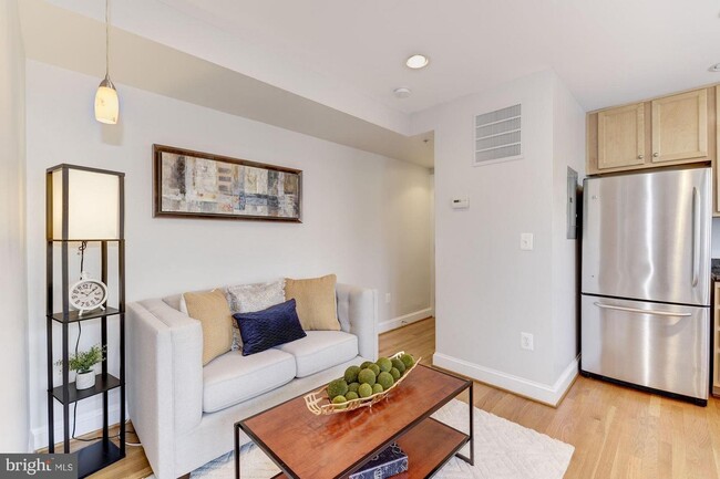 Main living area to kitchen - 1927 3rd St NE Unit 301