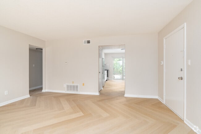 2BR, 1.5BA - 947SF - Living Room - Palomino Apartments