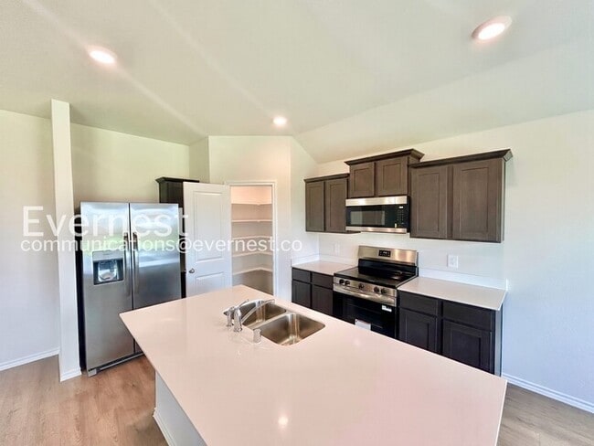 Photo - Modern Living with Fenced Yard and Garage Access / 3 Bed & 2 Bath / Available Now!