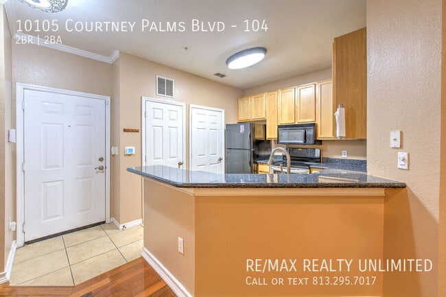 Photo - 10105 Courtney Palms Blvd Unit 104