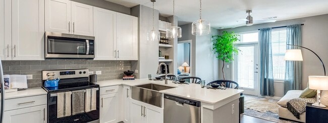Building Photo - Comfort, Location & Value Combined! Unit LXS