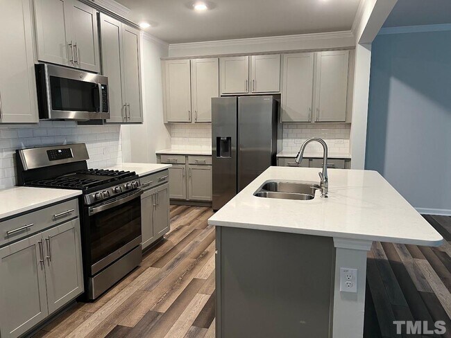 Photo - End Unit Townhome for Rent 3 bedroom Double Garage