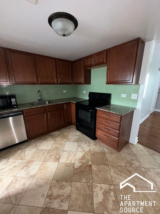 Building Photo - 7628 N Milwaukee Ave Unit 1B