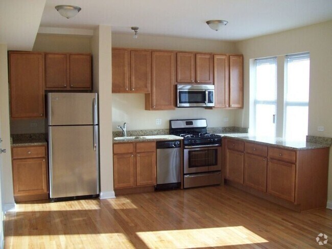 Building Photo - 3007 N Spaulding Ave Unit 1 Rental