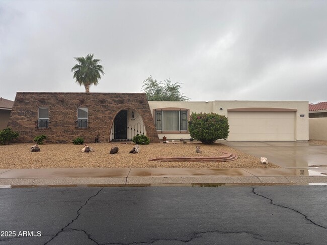 Building Photo - 9719 W Rolling Hills Dr