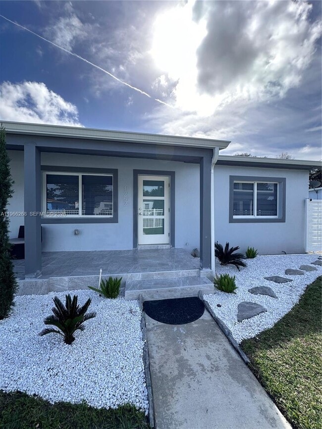 Building Photo - 1250 NW 57th St Unit 1252