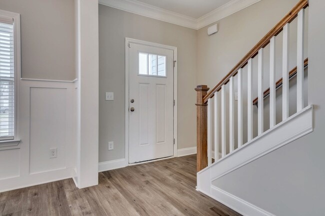 Photo - Discover comfort and convenience in this spacious 4-bedroom home, brimming with amenities, locate...