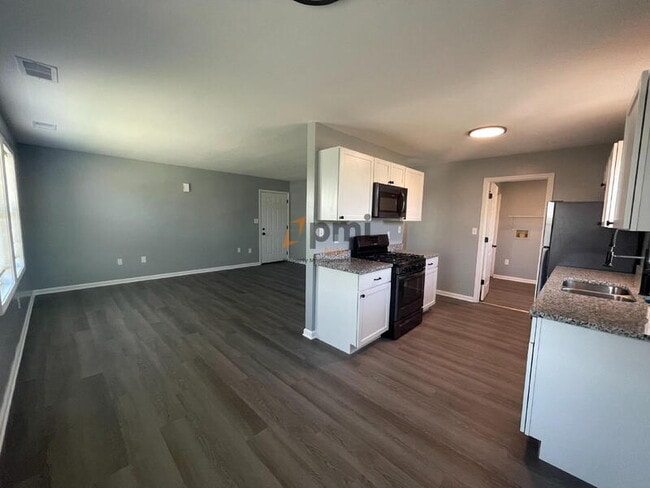 Building Photo - 5930 Fiesta Ave Unit Apt D