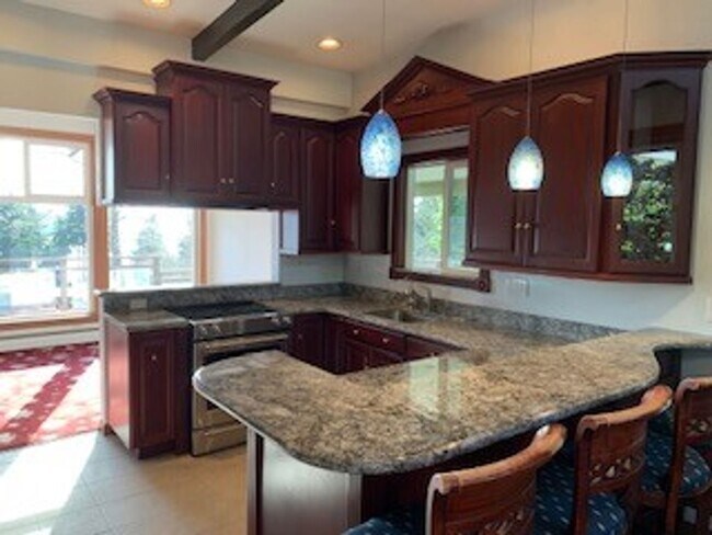 Photo - 4 BR 2.5 BA Mid-Century Modern with View of L.k WA. Lake Forrest Park $4500/MO