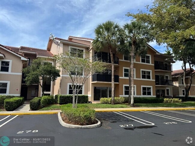 Building Photo - 8955 Wiles Rd Unit 206 Rental