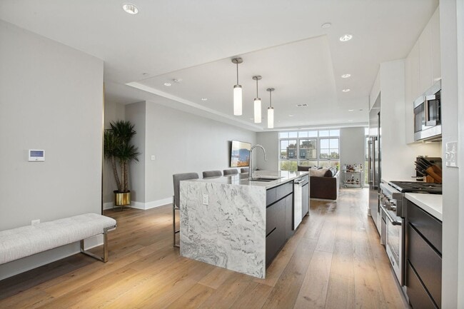 Photo - Elegant 2BR at The Adora | 1,500+ SF, Chef’s Kitchen & Garage Parking!